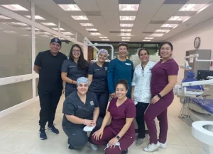 dental hygienist volunteers Guatemala A group of dental hygienists and a dentist posing for a photo in a dental clinic, with