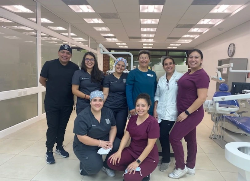 dental hygienist volunteers Guatemala A group of dental hygienists and a dentist posing for a photo in a dental clinic, with